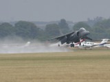Dux2003_005 - a Harrier takes off in the wet
