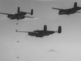 320__0003 - B-25's from 320 Squadron dropping bombs on occupied France