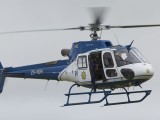 PE_067 - police chopper bringing the task team