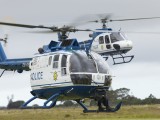 PE_069 - police chopper bringing the task team