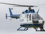 PE_071 - police chopper bringing the task team