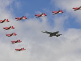 RIAT2009_195 - the Swiss team in PC7's in formation with a Swiss F18